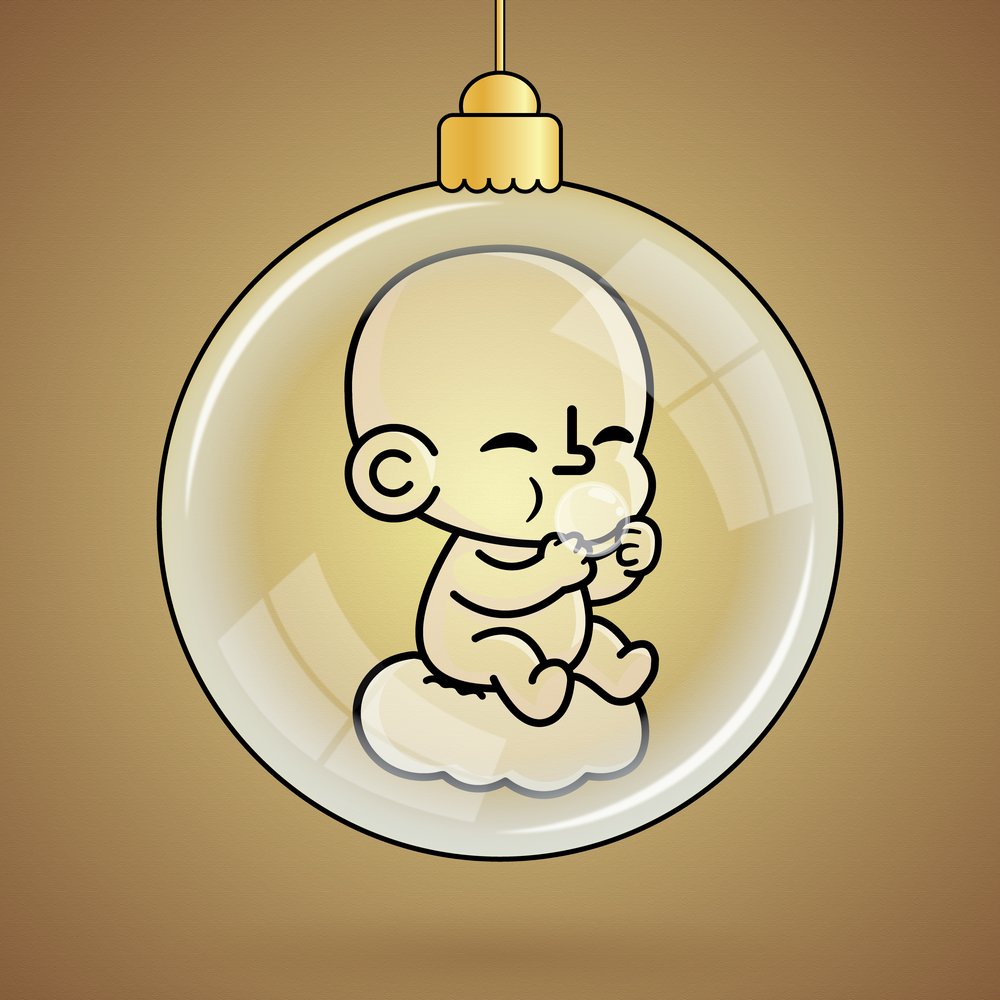 TOTZ sitting inside a glass ornament orb